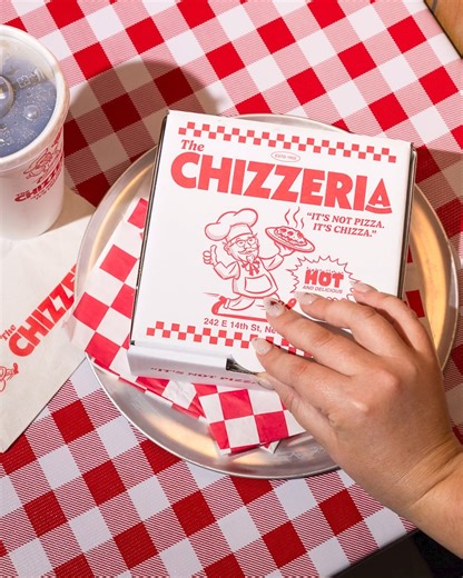 Opening the box on the NEW Chizza: crispy fried chicken topped with marinara, mozzarella, and pepperoni. Available now, only at KFC. | KFC