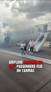 Passengers flee from a burning airplane on the tarmac at Denver International Airport. Everyone made it off, and one person was transported for medical attention for a minor injury, American Airlines said. | Fox News