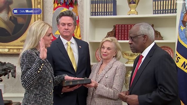 Pam Bondi is all smiles as she's sworn in as Attorney General