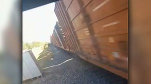 Watch school bus narrowly miss speeding train