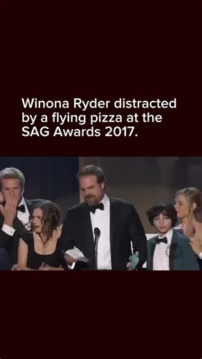 Movies | Streamers | Celebrities on Instagram: "Winona out here living pizza 🍿: At the 2017 SAG Awards, Winona Ryder went viral while standing onstage with the Stranger Things cast as they won Outstanding Performance by an Ensemble in a Drama Series, because her rapid-fire, confused-then-concerned facial expressions during David Harbour’s acceptance speech became instant meme material across social media; she’d also made headlines on the red carpet for keeping things low-key by styling herself