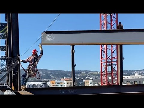 Union ironworkers hanging iron in San Francisco California