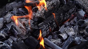 Burning ash covered coal - Free Stock Video