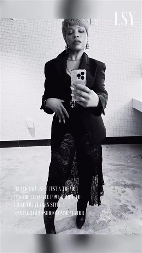 The-LSY on Instagram: "My LSY Edit: A Rose, Black Lace & My Signature Fuschia Lipstick “Black lace isn’t just a trend, it’s the ultimate power move to close the year in style.” -Instagram/Fashion Commentator I stepped into the gallery like a rumor whispered into velvet night. A single rose clutched between my fingers, its scent a quiet rebellion against the chill air. Black lace skims the room with delicate revolt, shadows, and soft spotlights tracing every move. My signature fuchsia lipstick is