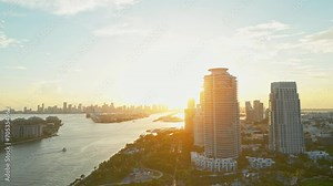 Miami aerial drone view. Art deco district. Famous avenue. Aerial view sunset sky, sand beach. Aerial of Ocean Drive in Miami. Twilight beach. Aerial view of Ocean Drive at Miami. Dusk, dawn in Miami.