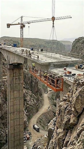 How Workers Connect a Bridge in Mid Air.