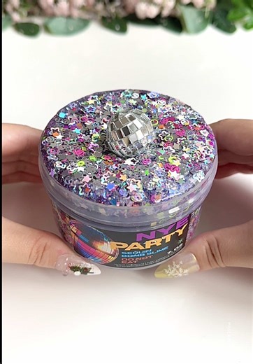 ♡ what are your plans for nye? // i will be counting down at home with my roommates. 🎉 ☆彡 🪩🎉 nye party \\\\ @og slimes ☻ • sequin bomb • scented unscented ✨if you want this slime or other fun ones, i’d be honored if you used my affiliate link to buy thru! i do get commission thru this link if you decide to use it, but regardless, i’m just happy you’re here so no pressure! ty always for the love & i appreciate you sooo much! ♥️ link in bio or go to https://ogslimes.com?code=57999CF60C94 !♥️ ☆彡