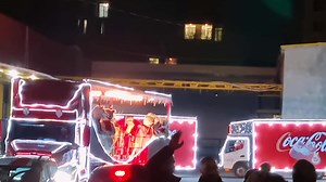 Download Tbilisi, Georgia, 2021- traditional red coca cola xmas open roof festive truck with white teddy bears inside. Christmas holiday celebrations and festive vehicle on road