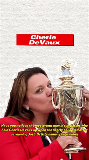 Have you noticed the mysterious man in sunglasses who held Cherie DeVaux up when she nearly collapsed after screaming José Ortiz’s name upon winning Hardly anyone realizes he is the crucial force behind Cherie making history as the first female champion of the Kentucky Derby.#bigreveal#bigrevealvfilmcontest #fyp #usa #cheriedevaux