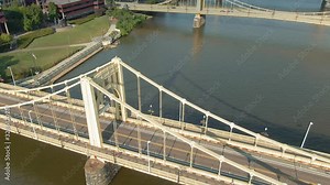 Aerial: Andy Warhol bridge over the Allegheny River & downtown Pittsburgh, Pennsylvania, USA