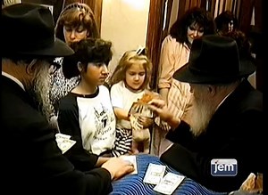 The Rebbe Gave Dollar to a Doll...