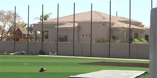 Neighbors upset with former MLB player building baseball field in backyard