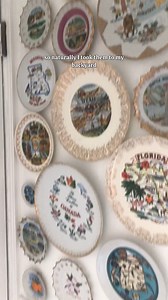 Love collecting vintage state plates? Here's a creative and weatherproof way to display them outside! I used a tile drill bit to hang thrifted plates on my patio wall, and they've held up beautifully for over 3 years. Perfect for adding charm to your outdoor space and showing off your favorite travel finds. | At Home with Ashley