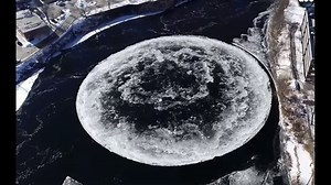 Giant rotating ice disk draws attention, visitors