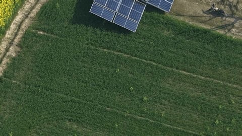 clip-4013274645-aerial-drone-footage-solar-panels-installation-on