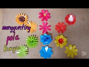 Melipat dan menggunting pola bunga sederhana