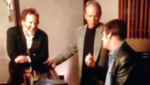 Circa 1995: Brian demonstrates the Beach Boys sound with Al’s help and Carl looking on. | Brian Wilson