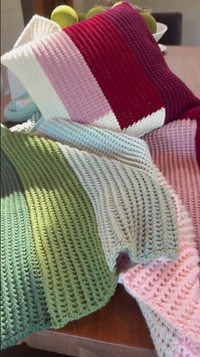 The winters embrace crochet collection. Cozy color block blanket with matching pillow pattern.