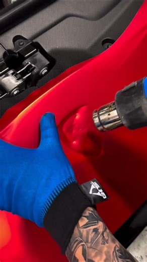 Azan Haider on Instagram: "The text describes the process of finishing the details on a Lamborghini front emblem. The work is being done on a Lamborghini front emblem. The emblem is being finished in satin red chrome. The hashtag "#WrapMeisters" suggests the work is related to vehicle wrapping or detailing 🚘🚘🚘"