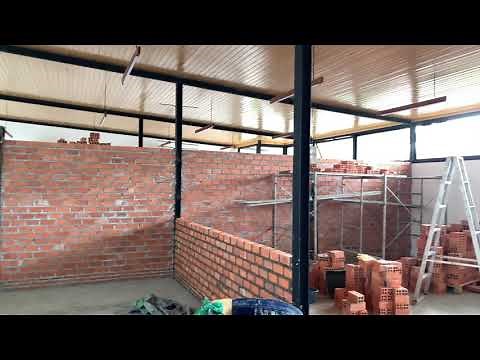 Single brick wall and column stiffener installation