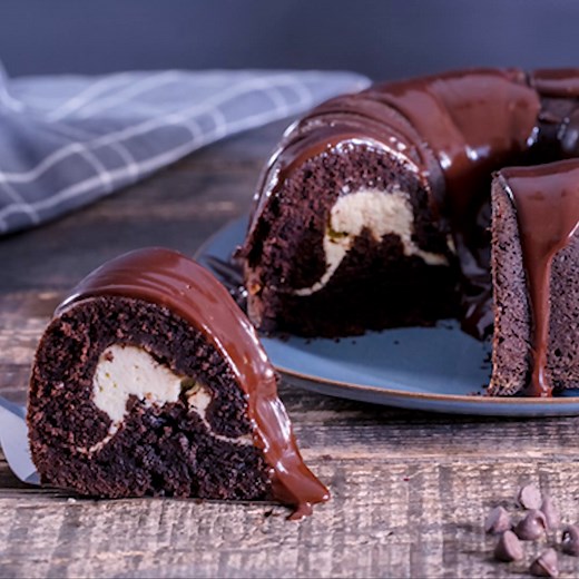 Chocolate Cream Cheese Bundt Cake - consists of a moist chocolatey cake, a creamy cream cheese filling and topped with chocolate ganache. So decadent, so tempting and so satisfying. #chocolatebundtcake #chocolatecreamcheesebundtcake #chocolatecake | Home Cooking Adventure