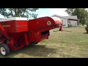1964 IH 80 pull behind combine running