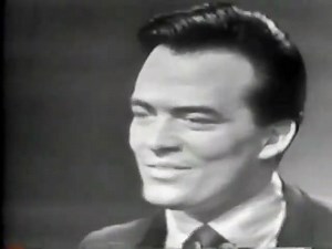 In the world of 1960s pop music, Ronnie Dove emerged as a beloved romantic ballad singer. With his smooth "crooning" style and handsome looks, he captivated millions of young listeners. The song "Hello Pretty Girl" is one of the signature hits of his career. His performance of the song on the famous television show Dick Clark's American Bandstand not only helped the song become a huge success but also cemented his place as one of the brightest stars of the era. The song was co-written by Ronnie 