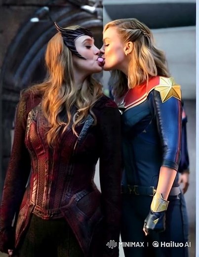 Scarlet witch and captain marvel kiss