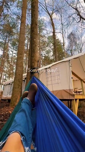 This is what complete disconnection feels like. Our new glamping tent is nestled in the woods where the only thing on your agenda is this—swaying in a hammock, forest views, and finally exhaling. Booking opens this month. Trust me, you're going to want this. Can you imagine waking up here? Follow along to see more of what’s coming! #glampinglife #natureconnection #naturevibes #outsideinncampground #santeesc | Outside Inn Campground