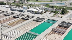 Disinfection pre-treatment tanks at Metropolitan Water District of Southern California - pullback aerial reveal