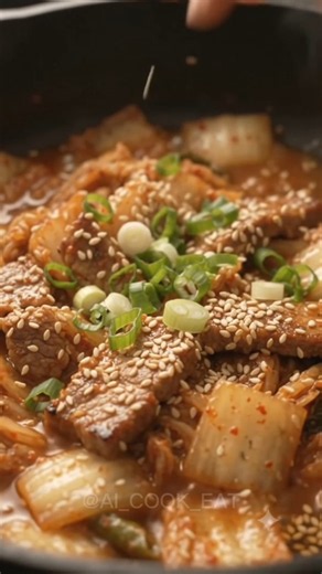 Thin-sliced pork, spicy kimchi, and a sesame finish 🌶️🥢 This stir-fry hits different. #cooking