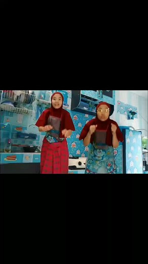 Cooking Dance Routine in a Colorful Kitchen
