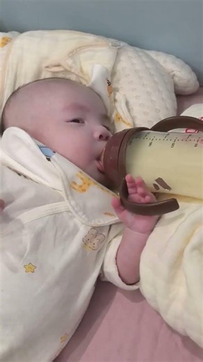 The Triplets Learn to Hold Their Bottles on Their Own #baby #triplets #babymilestone