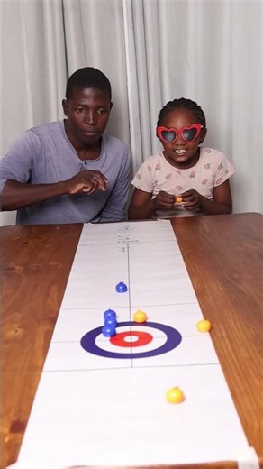 Tabletop Curling: Daughter vs Dad