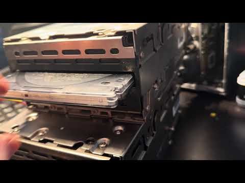 John NeXT Optical Disk Ejects and Spins so good candidate for recapping bundle on eBay store QR code