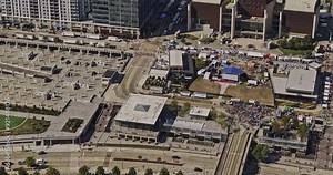Cincinnati Ohio Aerial v61 zoomed birds eye view flyover riverfront event, tilt up reveals downtown cityscape of central business district at daytime - Shot with Mavic 3 Pro Cine - September 2023