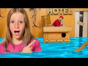 Nastya and her friends at a giant cardboard hotel