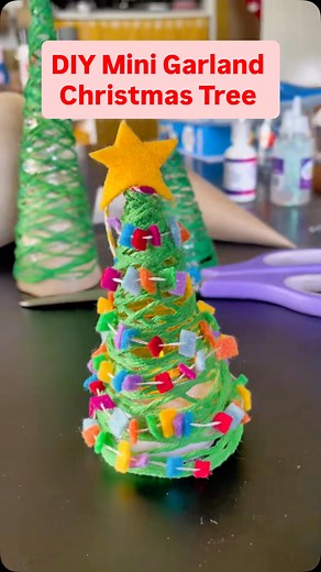 How I made the cutest mini felt garland for my yarn Christmas tree ornament This is such a simple and fun craft. Cut tiny felt squares, string them together, and wrap them around your tree with a dab of hot glue. Instant holiday magic! It’s easy, cozy, and adds the sweetest handmade touch to your holiday decor. Save this idea and tag me if you make one. I’d love to see your version! 🎄 #christmascrafts #easycrafts #kidscrafts #diycrafts | Timm Sevitz