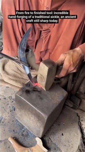 Blacksmith Forges Sickle Masterfully.