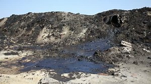 The former dump toxic waste, effects nature from contaminated soil and water with chemicals and oil, environmental disaster, contamination of the environment