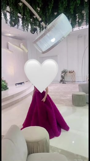 Elegant Magenta Gown Showcase in Luxurious Venue