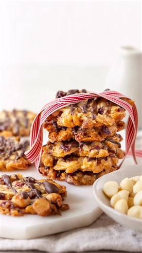 Australian Macadamias on Instagram: "Gluten-Free Macadamia Florentines: Crunchy, chewy, chocolate-drizzled perfection—these festive bites are made with Australian macadamias and are naturally gluten-free and dairy-free (with a vegan-friendly option too!). Packed with creamy macadamias, tart cherries and a decadent drizzle of dark chocolate, they’re the perfect holiday indulgence 🌞 💛 Wholesome ingredients 💛 Kid-friendly & great for gifting 💛 A luxurious twist on tradition 📌 Save this recipe