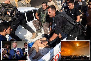 Video shows Hamas invading Israel, pulling Israeli soldier from tank