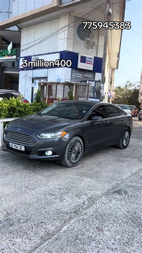 Ford Fusion TiTanium Année 2016 ESSENCE Automatique 4 cylindres Grand écran tactile Caméra de recul Radar Key let’s go Climatisation Bizone Commandes au volant Bluetooth, Aux, téléphone Excellent moteur Faible consommation