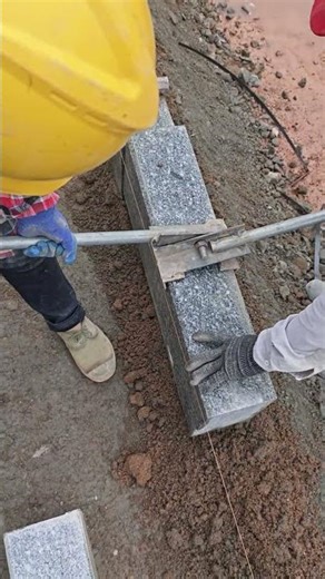 Still using brute force Check out this high-tech stone clamp.