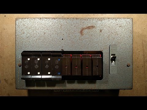 Teardown of an old British Wylex electrical fuse box. (with bare fuse wires)