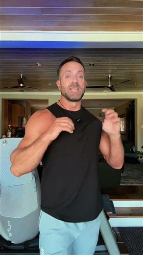 The JMIERR Men’s Drop Arm Tank Top is designed with a balanced athletic fit that gives you room to