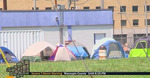 Springfield homeless population sets up tents outside the city's cooling center