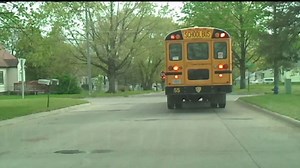 Do you know when stopping is required around a school bus?