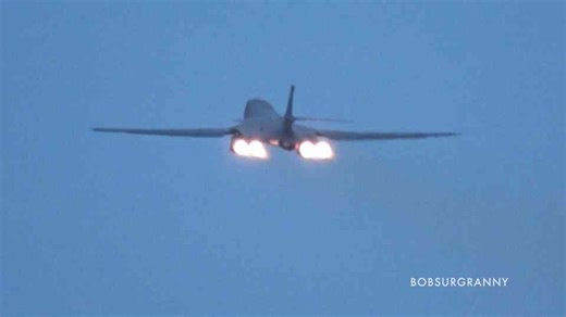 Watch a B-1 Lancer take off at sunrise with four afterburners blazing